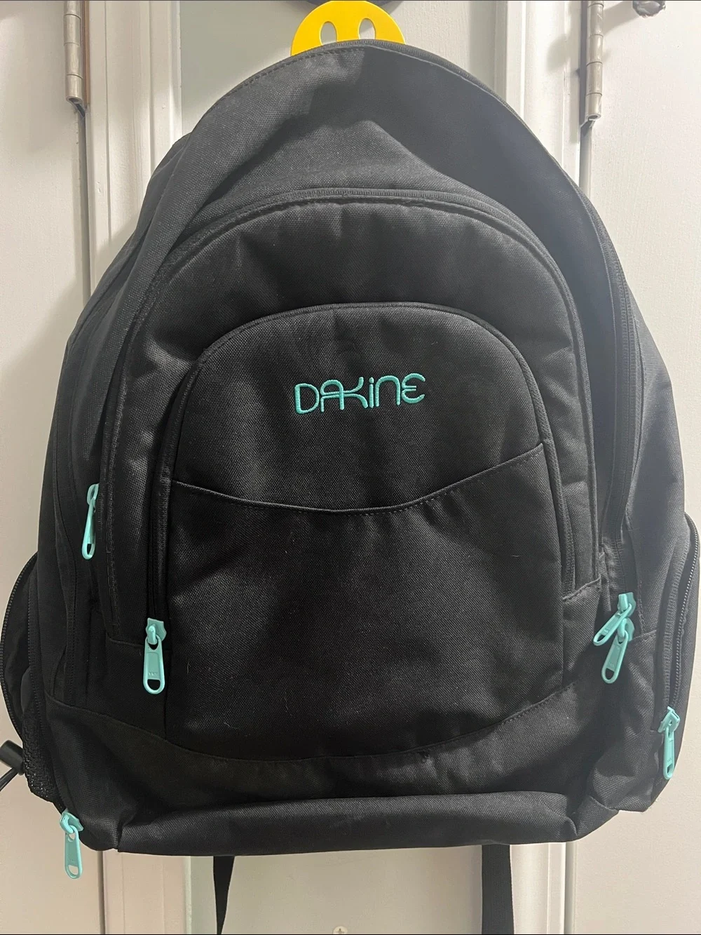 Dakine Black Backpack with Teal Accents